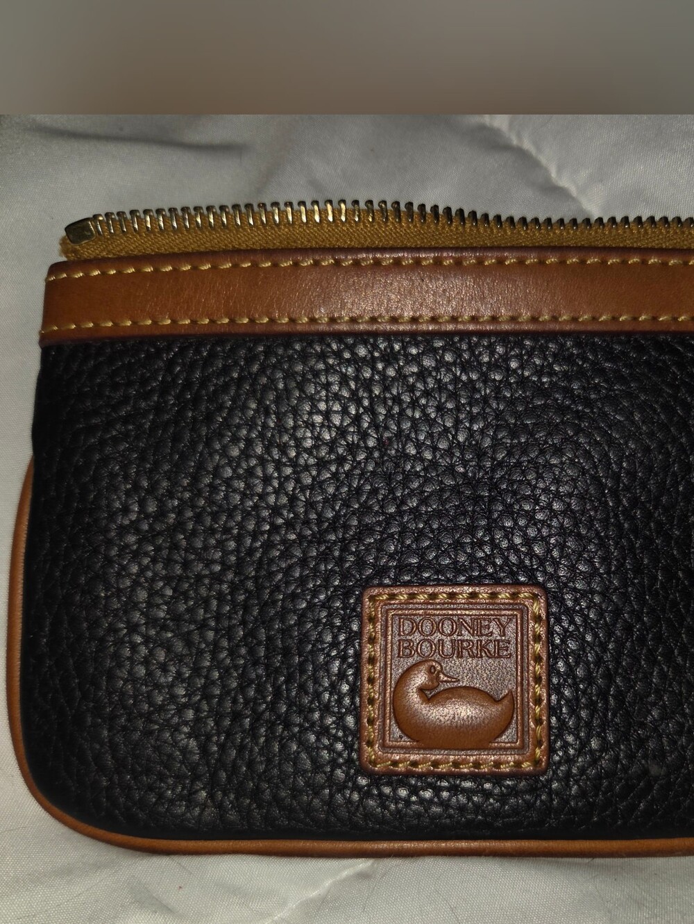 Dooney & Bourke Black Pebbled Leather Wristlet with Brown Trim